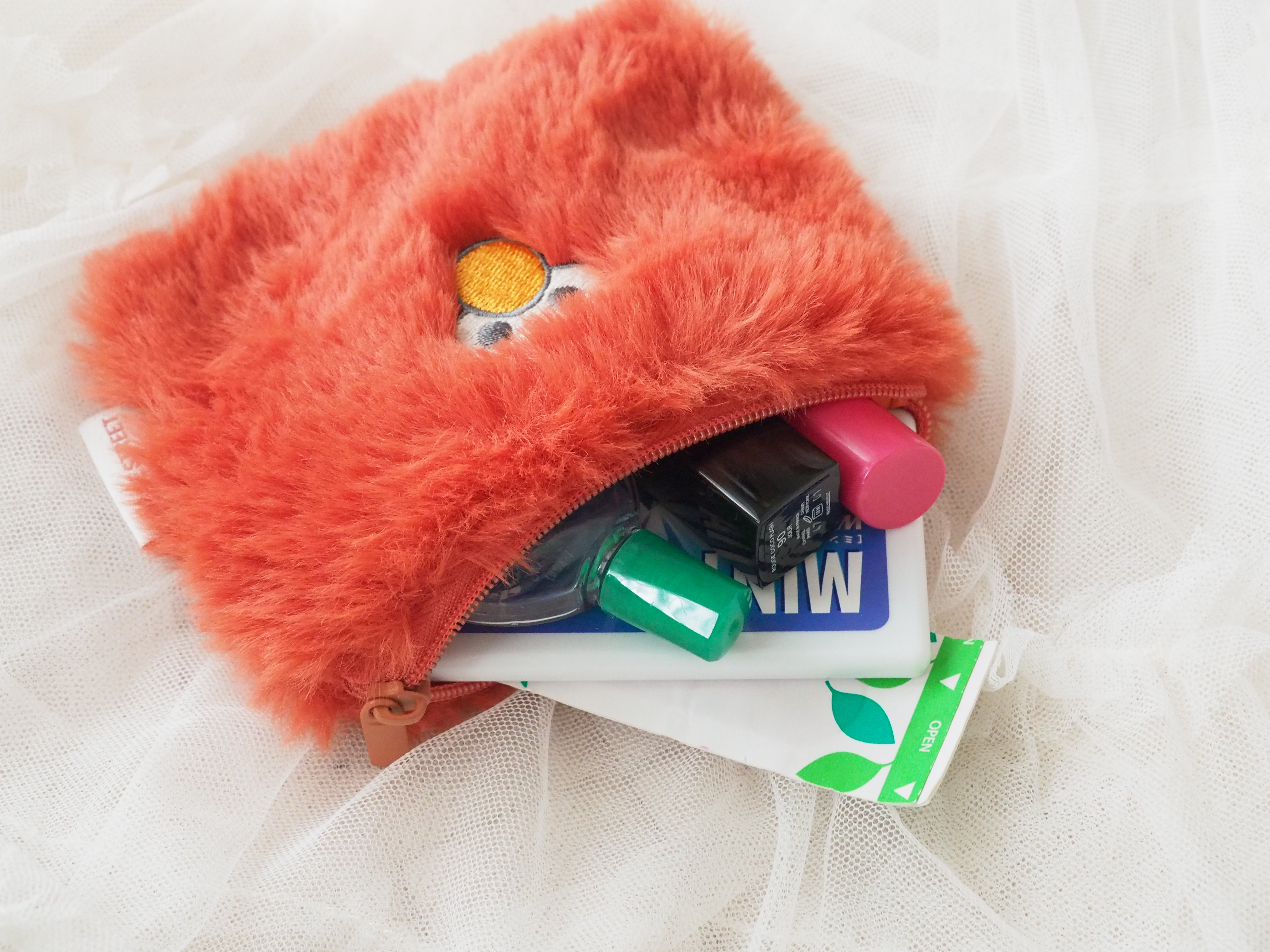 まるで本物なエルモとクッキーモンスターのポーチ♡幼きころの夢が叶う